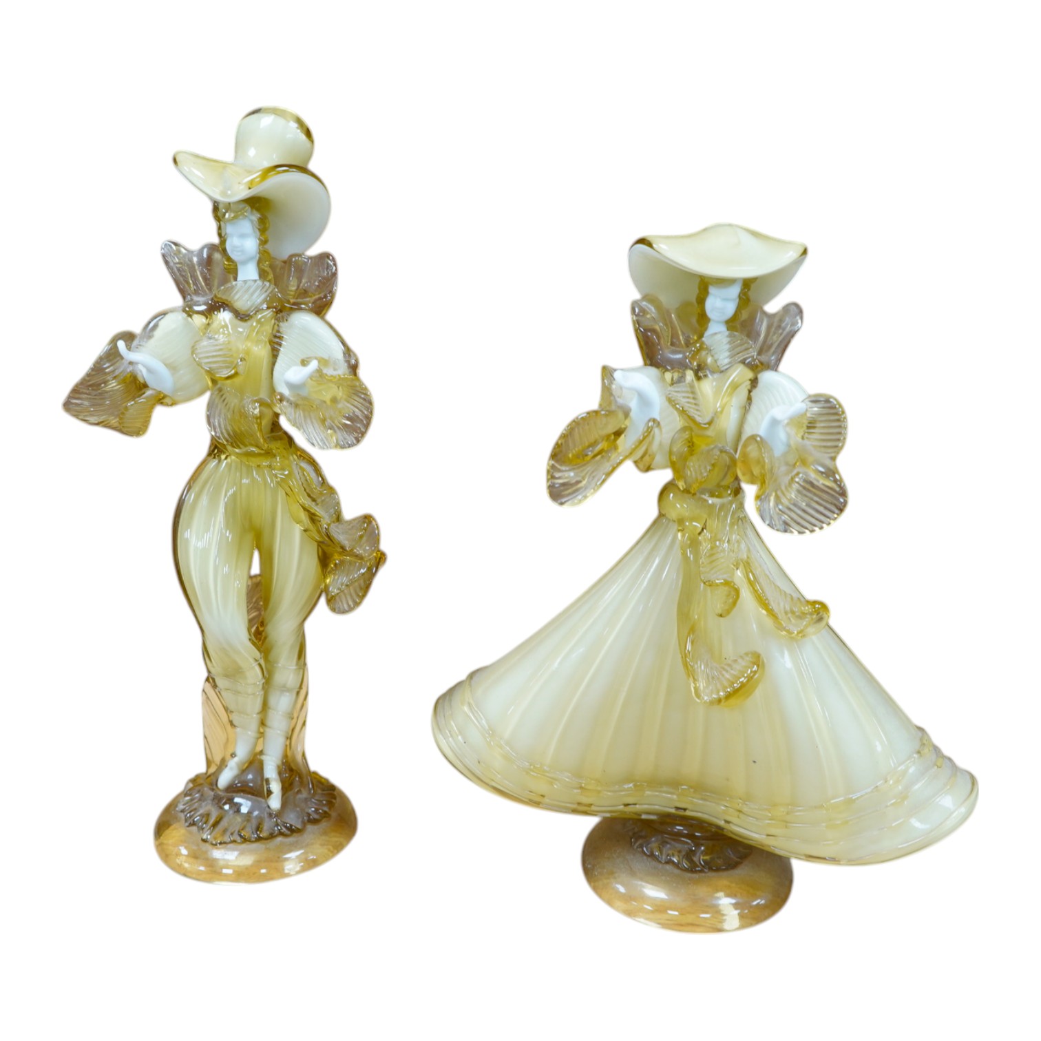 A pair of Murano amber and cream glass figures, tallest 38cm high. Condition - good